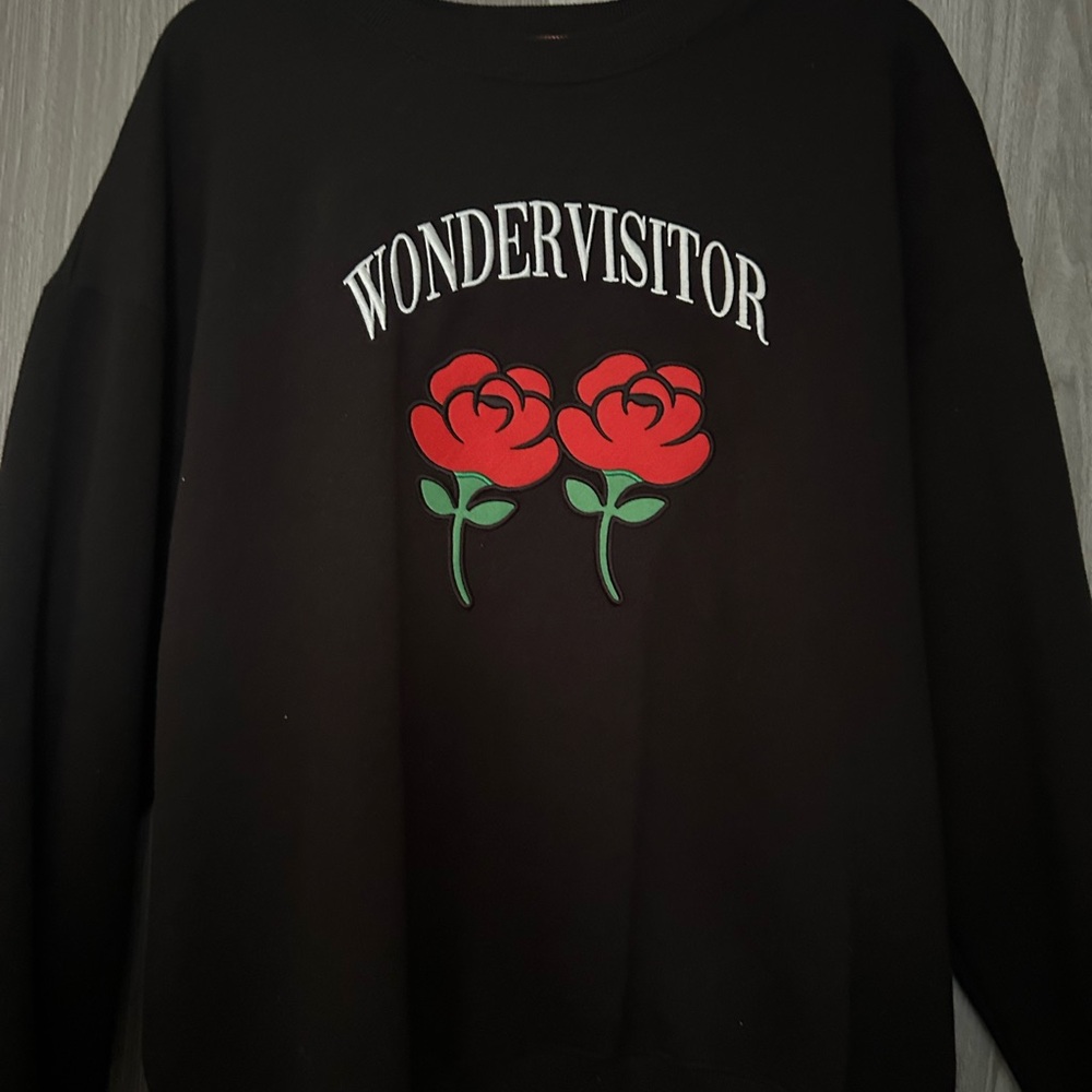 Black Crewneck Sweater with Red Rose Graphic